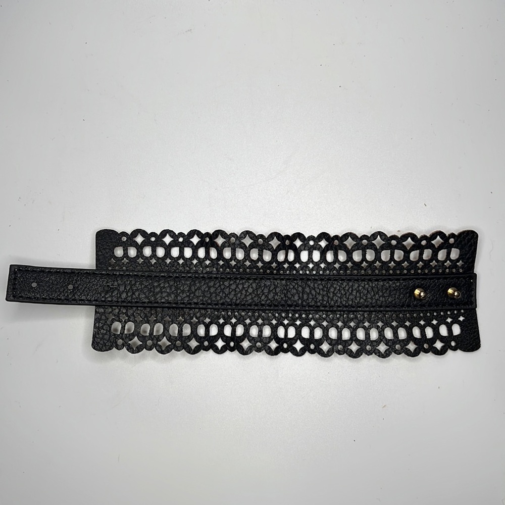 NWOT Never worn BCBG Maxazaria laser cut black cuff,